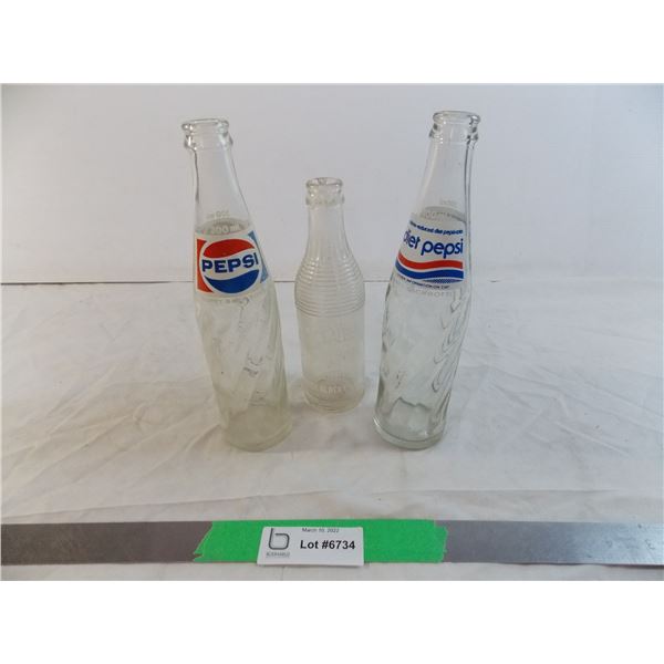 Pepsi bottles + glass water bottle