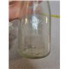 Image 2 : Antique milk bottle