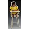 Image 1 : Black Baby in High Chair.