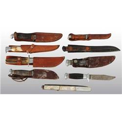 Lot of 9: Knives in Leather Sheaths.