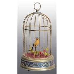 Bird in Cage Wind-Up Toy.