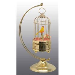 Bird in Cage Wind-Up Toy.