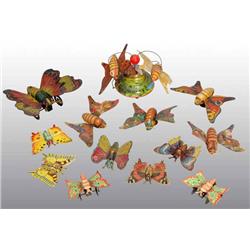 Lot of 13: Tin Butterfly Toys.