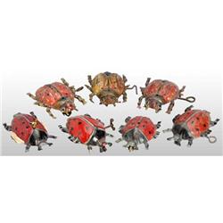 Lot of 7: Tin Litho Beetle Pull & Wind-Up Toys.