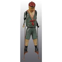 Tin Hand-Painted Boy on Stilts Wind-Up Toy.