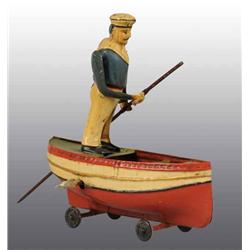Tin Hand-Painted Man Rowing Boat Wind-Up Toy.
