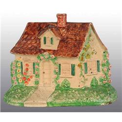Cast Iron Hubley Cottage Doorstop.