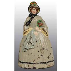 Cast Iron Colonial Dame Doorstop.