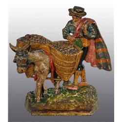 Cast Iron The Olive Picker Doorstop.