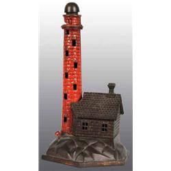 Cast Iron Lighthouse Mechanical Bank.