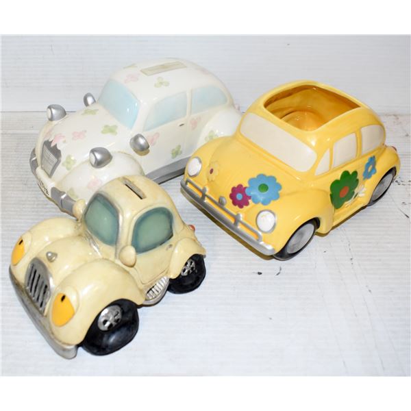 2 VW PIGGY BANKS AND 1 VW PLANT POT