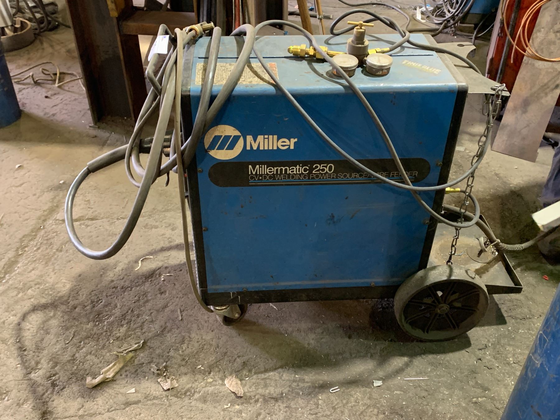 MILLER MILLERMATIC 250 MOBILE WIRE FEED WELDER WITH GROUND CABLE AND GUN