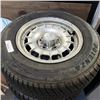 Image 2 : 4 BRIDGESTONE P205 70 R14 TIRES ON 5 BOLT MERCEDES RIMS ALL TIRE TREAD MEASURE 10/32NDS