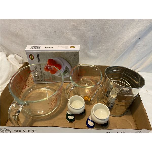 Sifter, scale, measuring cups and egg cups