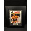 Image 1 : STAN SMYL SIGNED AND FRAMED VINTAGE CANUCKS MAGAZINE