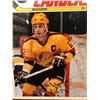 Image 2 : STAN SMYL SIGNED AND FRAMED VINTAGE CANUCKS MAGAZINE