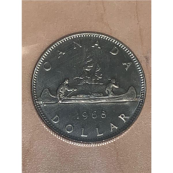 Royal Canadian Mint 1968 Canoe One Dollar Coin. mint sealed