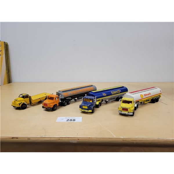 FOUR DIE CAST MINIATURE SEMI TRUCKS