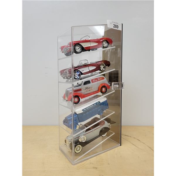 FIVE DIE CAST CARS IN DISPLAY CASE