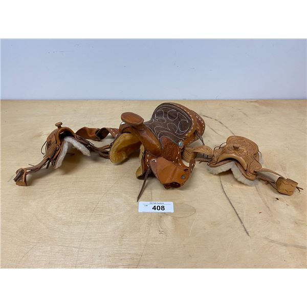 THREE MINIATURE SADDLES