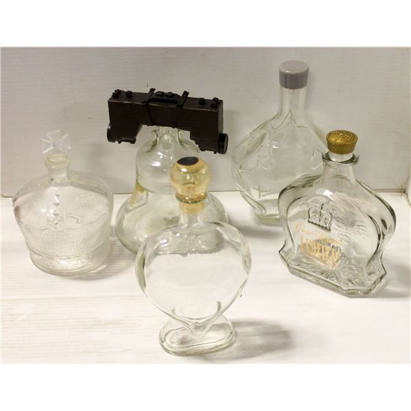 FLAT OF GLASS DECANTERS INCLUDES BELL SHAPED