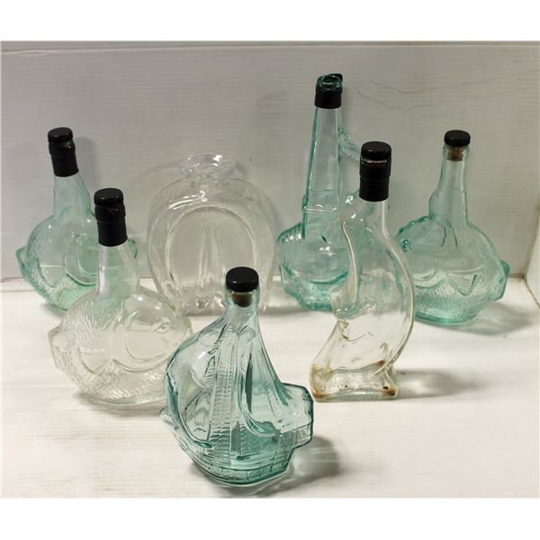 FLAT OF GLASS DECANTERS INCLUDES ELEPHANT SHAPED