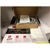 Image 1 : Delta Round Nightlight Toilet Seat with Hand Held Bidet Sprayer Kit