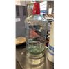 Image 3 : GLASS CARBOY WITH ROLL OF RALSTROM FILM AND FOLDING STOOL