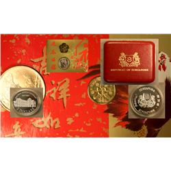 1980 Proof coin set, 1989 Mint set, 1990 Mint set, 1987 doll