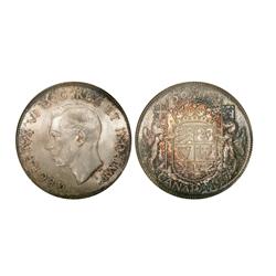 1937 50¢ PCGS/ICCS MS65.  Gem coin with cream coloured tone.