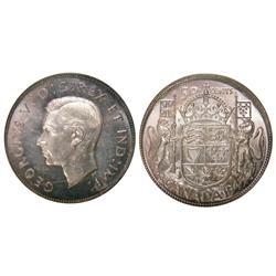 1945 50¢ Norweb PCGS MS65.  Light purple rim tone.