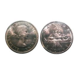 1959 $1 ICCS MS65.  Gem example with scattered gold and purp