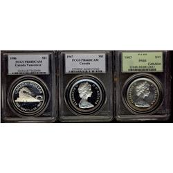 1967 $1PR66 & PR66DCAM and 1986 Vancouver PR68DCAM.  Lot of 