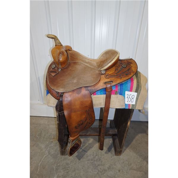 Saddle - Custom made, Hand Tooled 15in. Derek Cherry Barrel Saddle in good condition.Sheepskin lined
