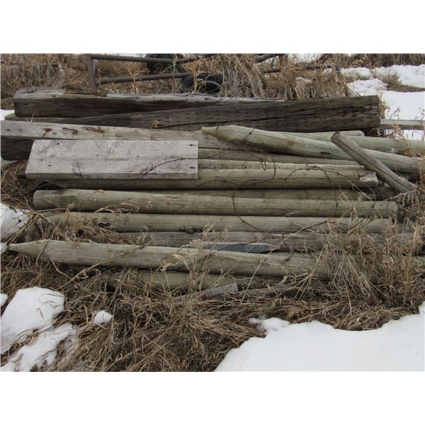 pile of assorted sizes of new fence posts and some rail ties - Consignment for Kelly Konieczny
