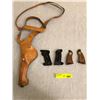 Image 1 : Large leather revolver holster and unknown pistol grips