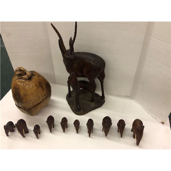 Large Group of Carved Wood Elephants with bone tusks, Sprinkbuck and Pomegranet Husk from South Afri
