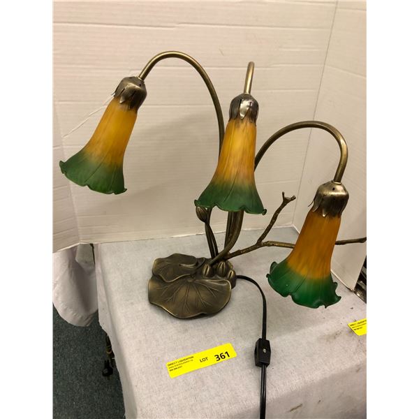 Lamp with Three Lilies on Lilly Pad  has broken branch