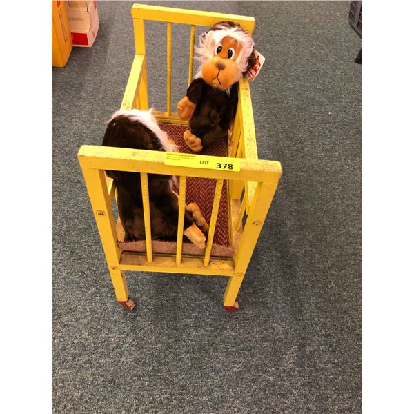 Antique Yellow Doll Crib on wheels with two Stuffed Monkeys