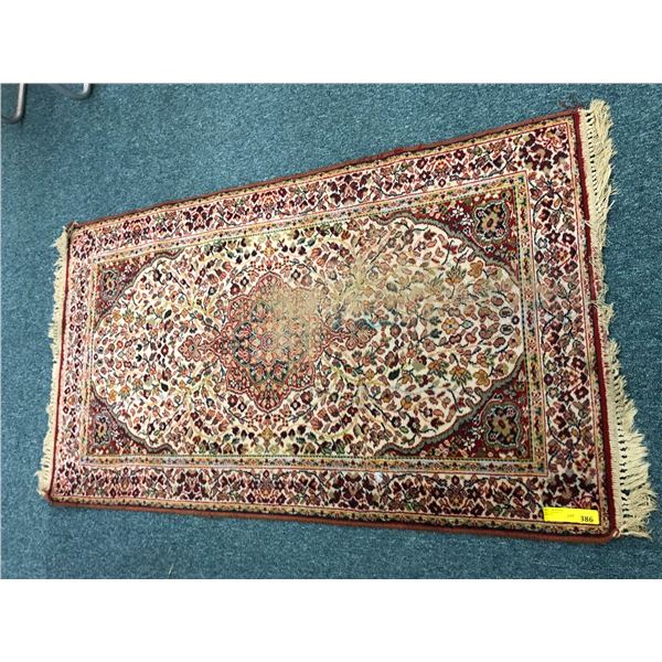 Area Carpet with fringed ends - approx. 35in x 63in
