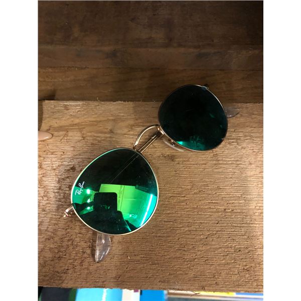 Pair of Green Lensed Rayan Sunglasses