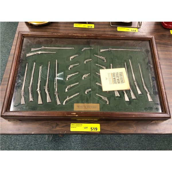 Miniature Cast Pewter Gun Collection in attractive/hardwood display cast depicting "The Guns That Wo