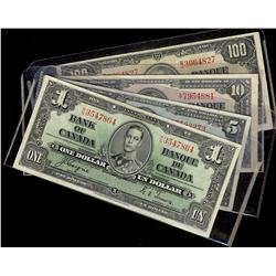 1937 $1 BC-21d, BC-23c $5, BC-24c $10 and BC-27b $100.  Lot of four notes VF to EF.