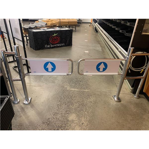 Set of Chrome one way walk thru security gates -buyer must remove