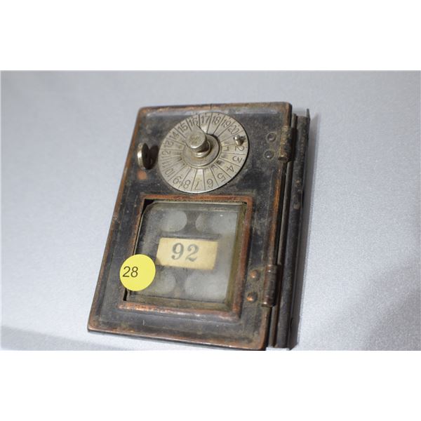 Antique brass post office door