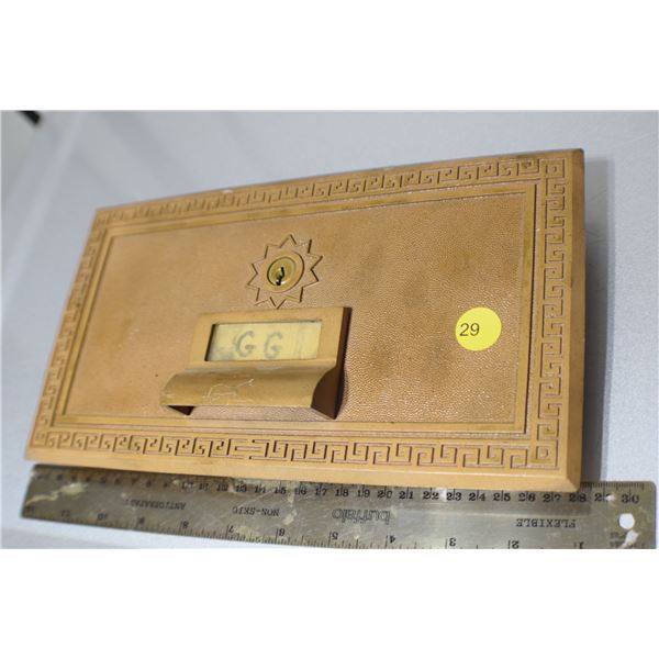 Antique brass post office door