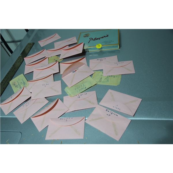 Player's tobacco tin of stamps