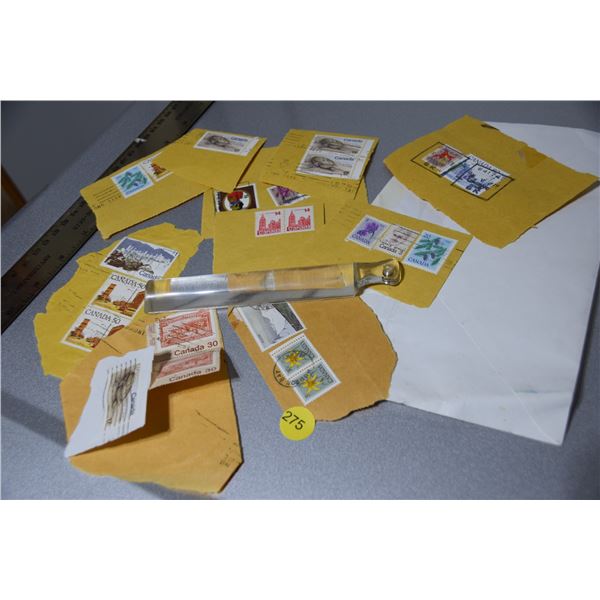 Canada stamps with magnifier