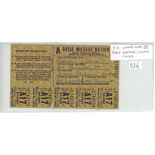 U.S. World War II Gas Ration Coupon Card with 6 coupons still attached. The owner drove a 1941 Chevr