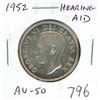 Image 1 : 1952 Silver 50 Cents. Hearing Aid variety, the result of a Die Clash. AU-50.